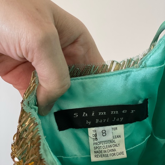 A party dress, worn once. It comes with a bolero. Size 8 - Picture 6 of 7